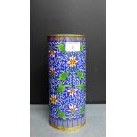 A Cloisonne vase of tall cylindrical form, the blue ground with flowers and foliage, 23cm high