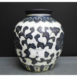 A blue and white Cizhou type vase with sgraffito foliage and flower decoration, 20cm high