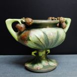 An Austrian Art Nouveau twin handled bowl with fruit and leaf pattern impressed Turn to the base,