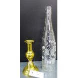 Eau de Vie etched glass bottle together with a knop stemmed brass candlestick, tallest 33cm (2)