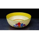 A Clarice Cliff Bizarre 'Crocus' patterned bowl with printed back stamps, 20cm diameter