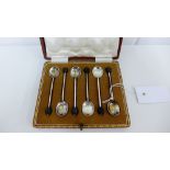 A set of six George V silver coffee bean handled spoons, in a fitted case, Sheffield 1915