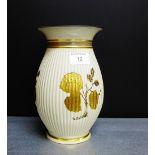 A Royal Copenhagen baluster vase numbered 2495 with gilded leaf and foliage pattern, 21cm high