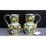 A pair of Torquay pottery Scandy pattern double gourd jugs, 14.5cm high (2)