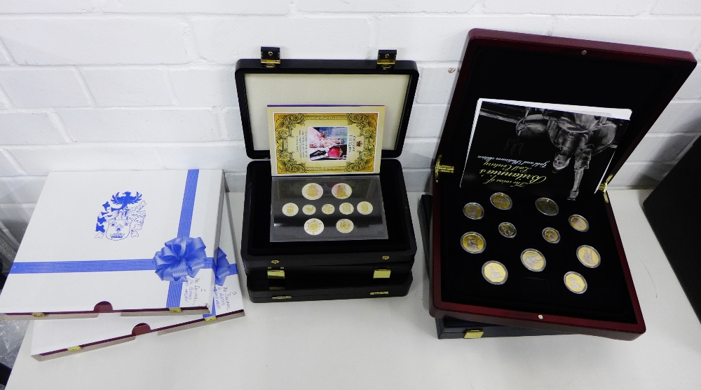 A collection of coin sets to include Coins of WWII Numistic Set, The 1953 Coronation Set, Two