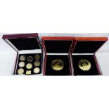 The London Mint Office Great Britain Five Shilling Crown Collection together with two cased