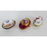 Three Limoges porcelain trinket boxes with gilt metal mounts, 7cm long (3)