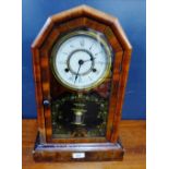 An American faux mahogany cased mantle clock, 47 x 30cm