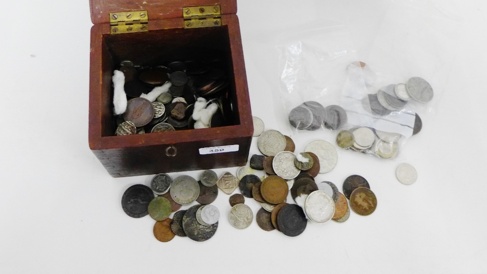 A quantity of pre-decimal UK and World coins and to include a Georgian copper cartwheel coin, a
