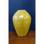 A Studio pottery high shouldered vase with yellow glaze an abstract pattern, 32cm high