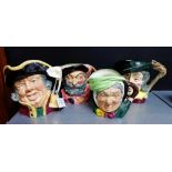 A group of four Royal Doulton Toby jugs to include 'Town Crier' D6530, 'Pied Piper' D6403, 'Sairey