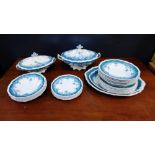 A Staffordshire dinner service comprising tureens, plates and bowls etc.