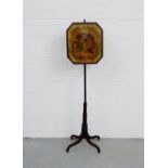 A mahogany pole screen with octagonal embroidered panel, 150cm high approx