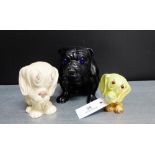 Three novelty dog figures to include a black glazed bulldog, a Sylvac No.1246 dog and a small