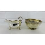 An Edwardian silver sauce boat with makers marks for Henry Atkin, Sheffield 1902 together with an