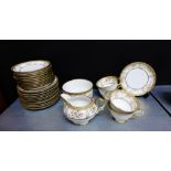 A Noritake floral decorated porcelain tea set with gilt highlights comprising twelve cups, twelve