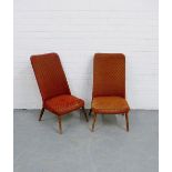 A pair of mid century upholstered side chairs on turned beech supports (2)