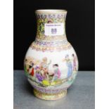 A Chinese Famille Rose vase painted with 'The Eight Immortals' and calligraphy bearing seal mark