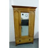 An oak mirror door wardrobe, with a single long drawer to the base 210 x 120cm