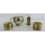 A mixed lot of Birmingham silver to include a pair of napkin rings, sugar bowl and pepper pot (4)