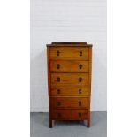 An oak ledgeback six drawer chest, 126 x 62cm