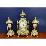 A gilt metal and faux ceramic clock garniture in the Rococo style, 42cm high (3)