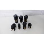 A troop of seven early 20th century ebony elephants, largest 8cm high (7)