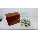 A mahogany box containing a small collection of costume jewellery etc.