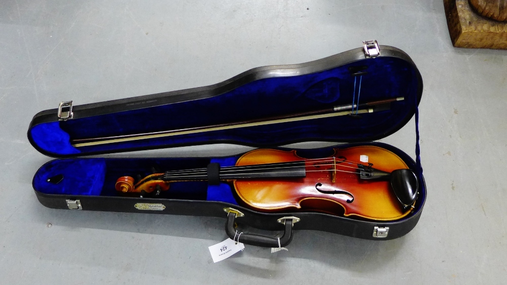 A violin in a fitted case