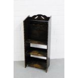 A stained oak paper rack and bookcase 79 x 34cm