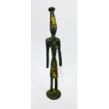 An African bronze and gold overlaid figure, 14cm tall