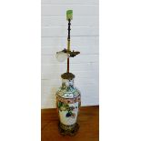 A Famille Verte baluster table lamp with gilt metal mounts and small jade plaque to top with twin