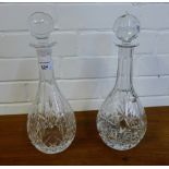 Two cut glass decanter and stoppers (2)