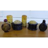 A pair of African hardwood containers and covers, together with two glass scent bottles and stoppers