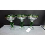 Three clear glass and green stemmed novelty cactus glasses (3)