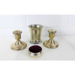 A contemporary London silver pin cushion, a pair of Birmingham silver desk candlesticks and a