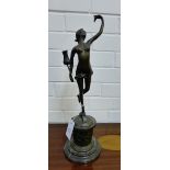 A bronze female nude on circular base, 49cm high