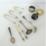 A mixed lot of silver to include a baby's rattle with teething ring, sifter spoons, napkin ring,