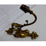 A brass Art Nouveau wall light, 27cm long