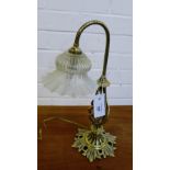 A brass table lamp with vaseline glass shade, 42cm high