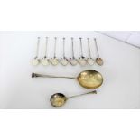 Set of eight George V Sheffield silver teaspoons together with two larger spoons (10)