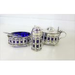 George VI Birmingham silver and blue glass condiment set comprising pepper pot, open salt and lidded