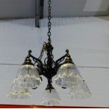 A pair of five branch faux bronze and clear glass shade light fittings (2)