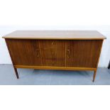 A retro veneered sideboard with rectangular moulded edge top over three central drawers and pair