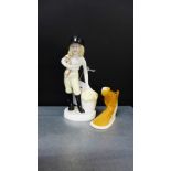 A Beswick Palomino horse wall plaque, together with a Coalport 'Feeding Time' porcelain figure,