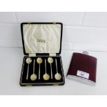 A cased set of six Birmingham silver teaspoons together with a leather and chrome 6oz hip flask (a