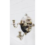 A 19th century Elkinton & Co silver plated three branch wall sconce with the oval back plate centred
