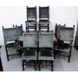 An oak dining suite comprising a set of eight bobbin turned chairs to include a pair of carvers,