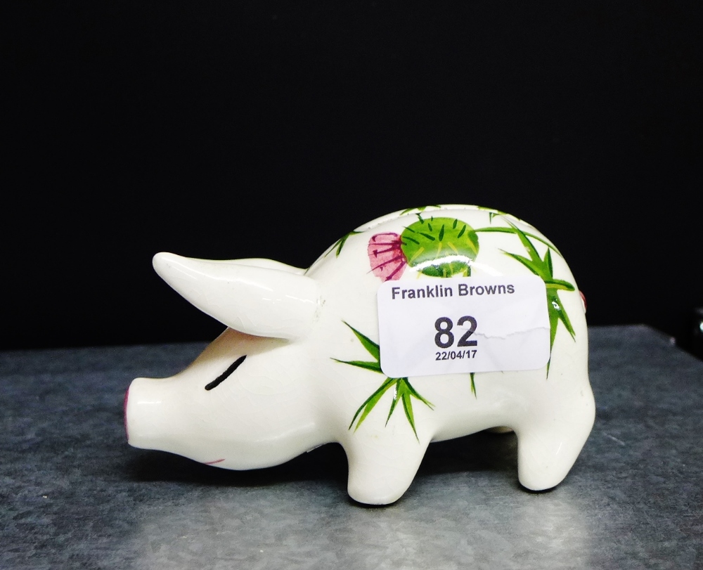 A Plichta 'Shamrock' patterned pig money bank, 12cm long