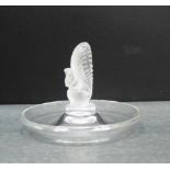 A Lalique France opaque glass squirrel on a clear glass circular base, 10cm diameter